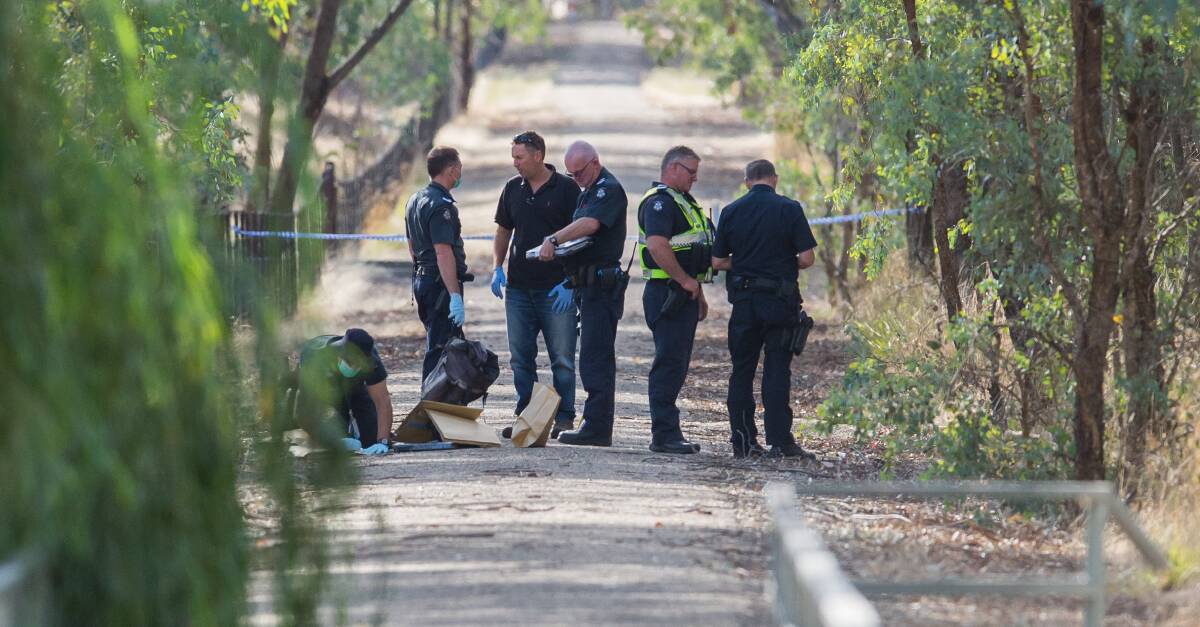 CRIME SCENE: Police conducted a line search near the site of the shooting. Pictures: MARK JESSER