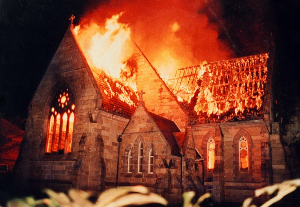 ALIGHT: The church is destroyed by fire in September 1991. 