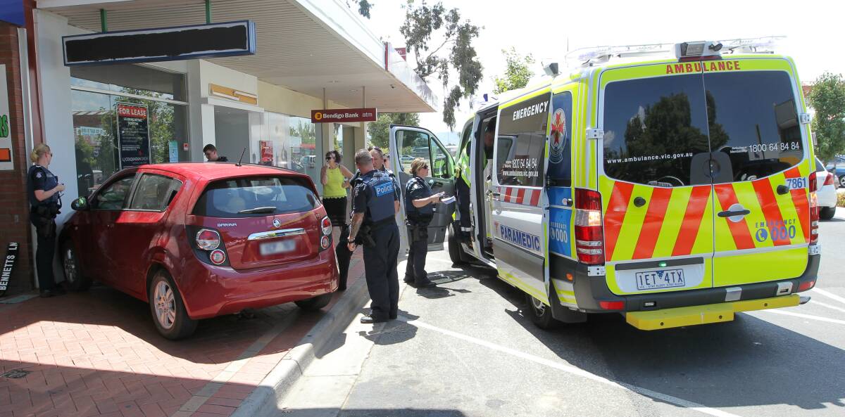 DAYLIGHT SMASH: A woman suffered a medical problem before driving onto the footpath on High Street in Wodonga. 