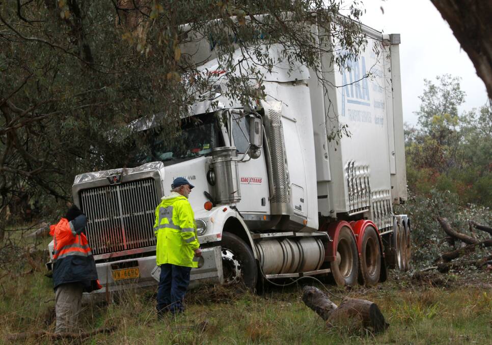 BOGGED: The B-double collided with several trees on highway median strip before becoming stuck. The crash occurred several kilometres south of Holbrook.