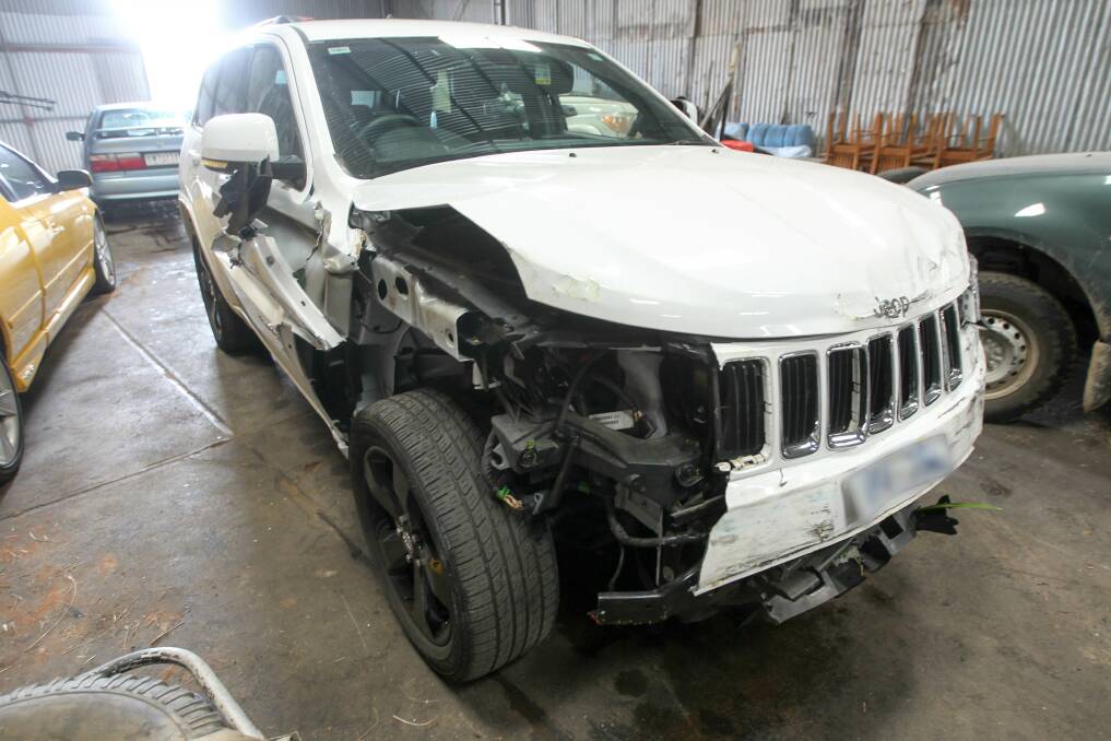 STOLEN: The white 2015 Jeep Grand Cherokee, which was taken from Wodonga about 20 minutes before the crash in Albury. 
