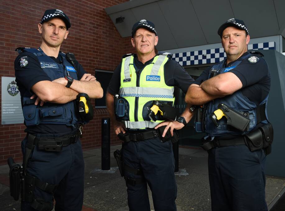 EQUIPPED: Acting Senior Sergeant Trevor Schultz, Sergeant Michael Connors and Acting Sergeant Scott Bradley with the devices at Wangaratta. Picture: MARK JESSER