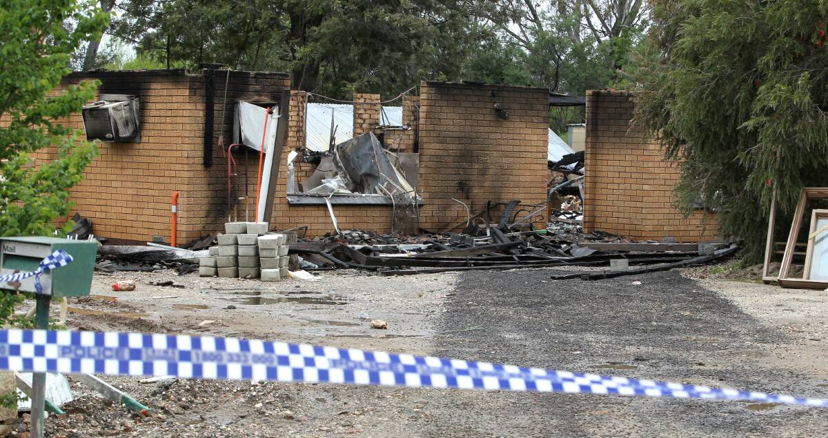 DESTROYED: This Wodonga home was evacuated as a safety precaution against rising floodwater, only to be gutted by fire. An electrical fault is being investigated as a possible cause. Picture: BLAIR THOMSON