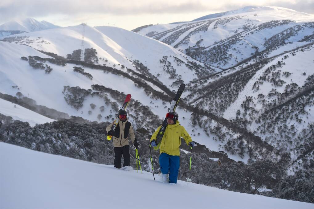 GOOD COVERAGE: Drew Jolowicz and Toshi Pander getting into the action at Mt Hotham earlier this week before Saturday's official ski season opening. Police are urging attendees to be prepared and cautious. Picture: CHRIS HOCKING