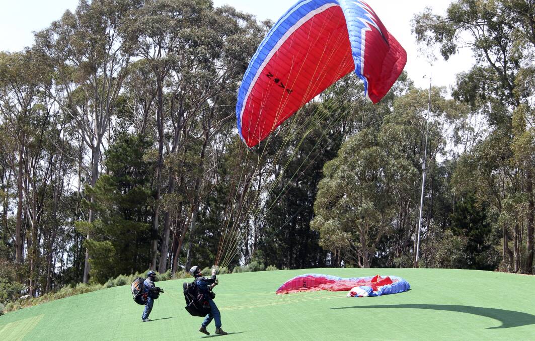 LAUNCH:  A file photo of paragliders at the Mystic Hill launch site. 
