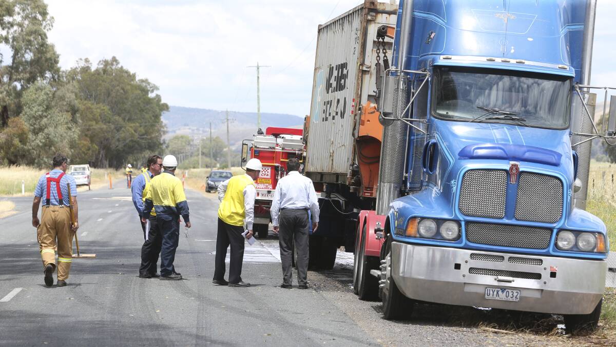 LEAK: The spill is examined by clean-up crews in the Indigo Valley. 