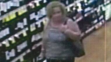 HELP SOUGHT: Police want to identify this woman after a theft on May 10. 