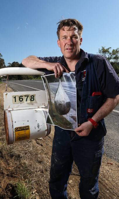 HELP: Dave McAuliffe has been forced to put his old letterbox back to use after thieves took off with his new letterbox from the front of his home. Picture: JAMES WILTSHIRE