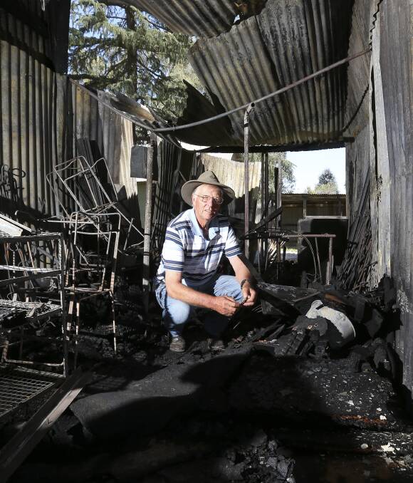 DAMAGE: Wangaratta Show Society president Bernie Evans inside the burnt stables. The building is used during the Wangaratta Show. The blaze will not impact upcoming events at the showgrounds. Picture: ELENOR TEDENBORG