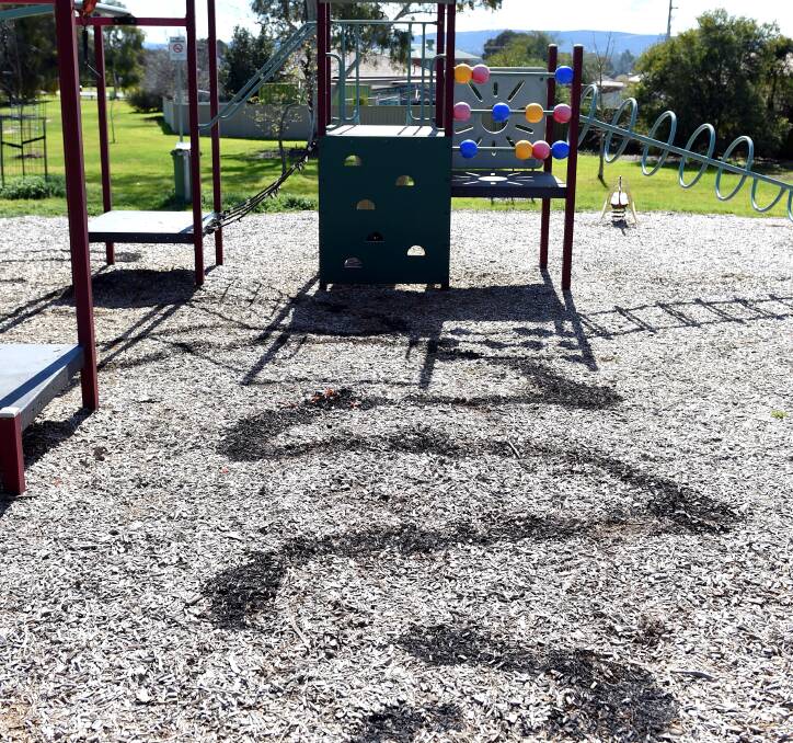 BURNT: Scorch marks left on the ground at Jack Maher Park after a fire on Saturday. The fire did not cause any serious damage to the playground. 