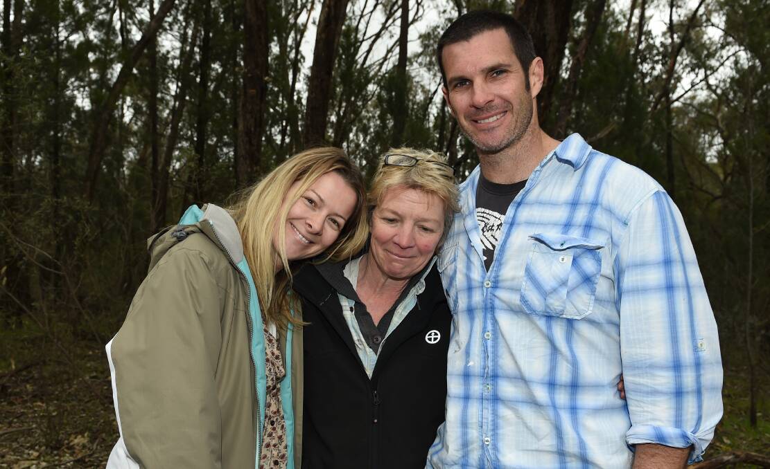 HAPPY: Wiggy Brennan, pictured centre with Belinda and Mat Saunders, was relieved when Ben was found. Picture: MARK JESSER
