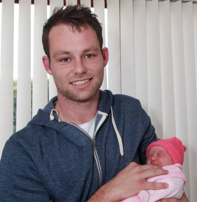 PROUD DAD: Wodonga's Jarrod Hodgkin and newborn daughter Neeve. Jarrod's fiancee, Shannen Feenan, gave birth Friday. Picture: SIMON BAYLISS