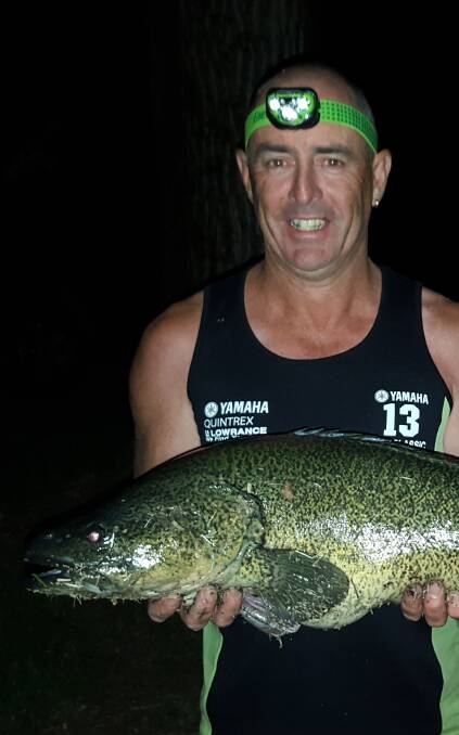 GREAT CATCH: Nathan Schneider's Kiewa River catch, hooked near Dederang. It was caught just before midnight and weighed in at 6.4kg and 72cm. 
