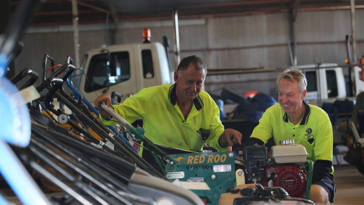 LOVE OF THE JOB: Charlie Millar, 64, loves turning up to work each day with Griffith City Hire's Garry Rennie. Picture: THE AREA NEWS