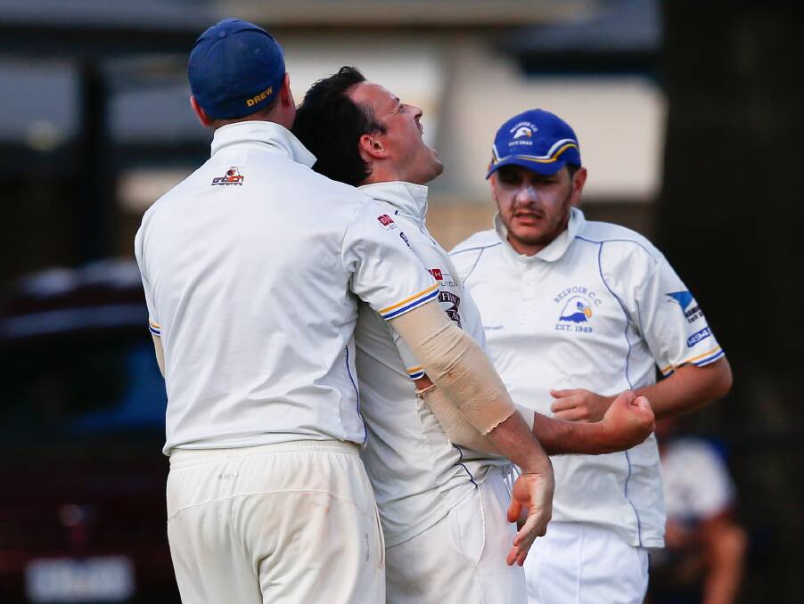 Belvoir bowler Matt Jaensch is congratulated after claiming another Wodonga scalp at Les Cheesley Oval.