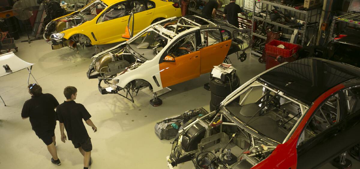 RACE TO BE READY: Brad Jones Racing's factory floor in East Albury is a hive of activity as cars are rebuilt from the chassis up ahead of the season's first testing at Winton on February 22. 