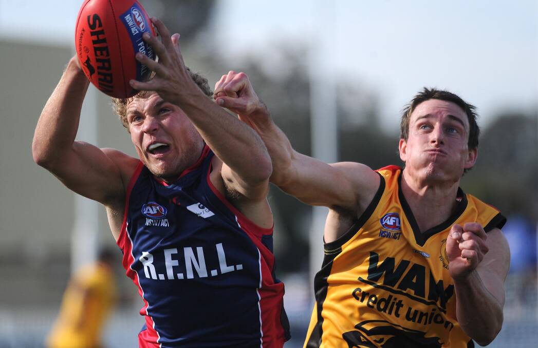 MASTER CLASS: Hume league's Duncan McMaster, who was the competition's best player, attempts to spoil Riverina opponent Jayden Klemke. Picture: LAURA HARDWICK