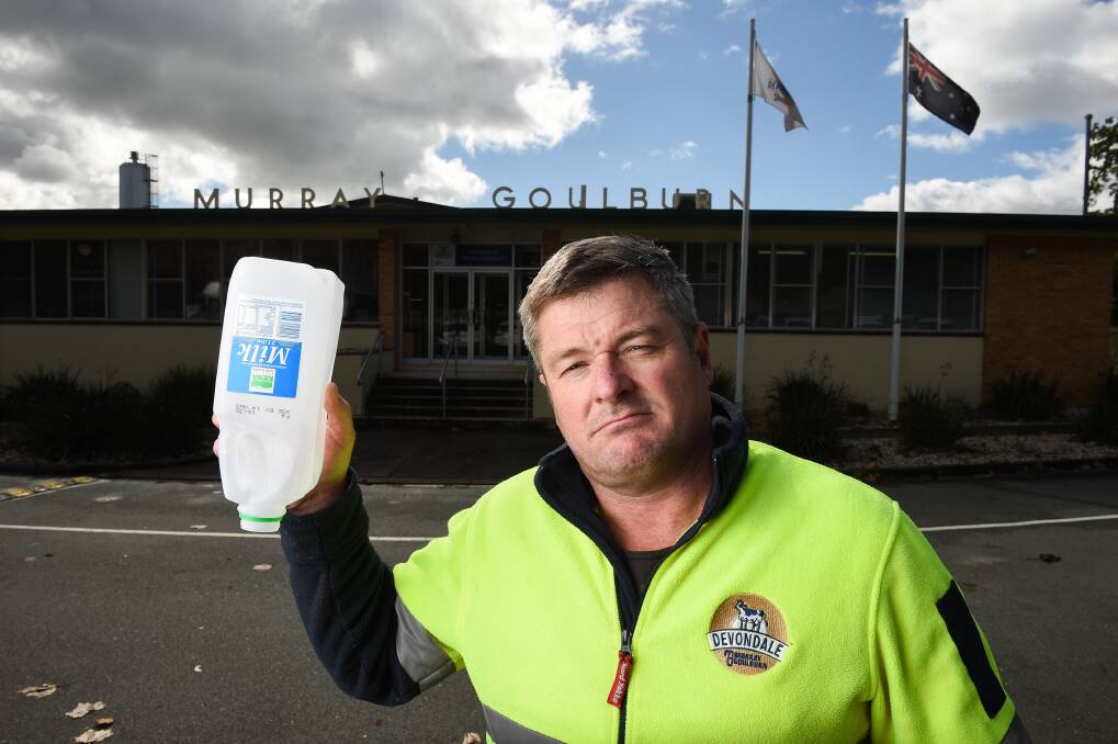 LAST DRINKS: Murray Goulburn worker Robert Ramsdell was devastated at the closure of Tangambalanga's milk processing plant. Picture: MARK JESSER
