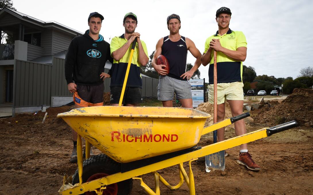 WORK IN PROGRESS: Raiders footballers and work colleagues Lachie Flagg, Adam Flagg, Jake Uslar and Steve Jolliffe. Picture: MARK JESSER