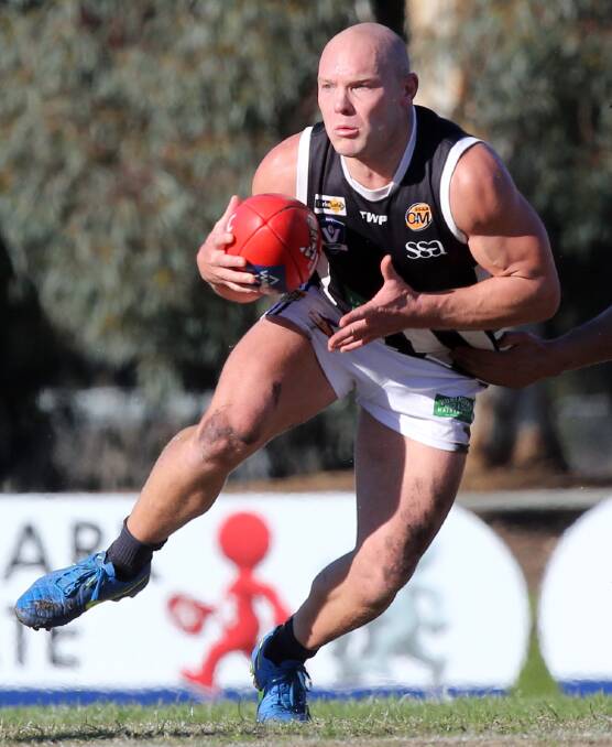WELCOME, MATT: Wangaratta's Matt Kelly will play his first match for the Magpies since round four after scans cleared the nuggety midfielder of serious injury.
