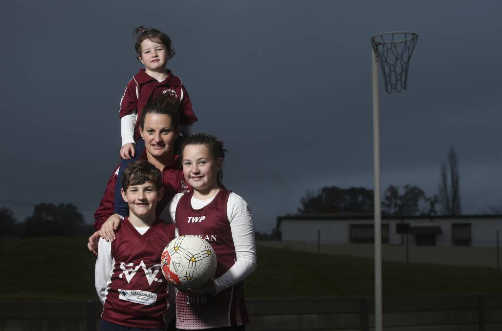 MURPHY'S MILESTONE: Twenty-two years after her debut, Kylie Murphy will play her 250th match for Wodonga when the Bulldogs host Lavington at John Flower Oval on Saturday. Children Lizzy, 9, Joseph, 8, and Maggie, 3, will be there to cheer their mum on. Picture: ELENOR TEDENBORG