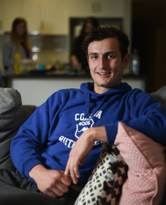 HOME, JAMES: Corowa-Rutherglen's James Svarc relaxes at his sisters' house in Albury ahead of the Roos' clash with Myrtleford on Sunday. Svarc has enjoyed a strong start to the Ovens and Murray season. Picture: MARK JESSER