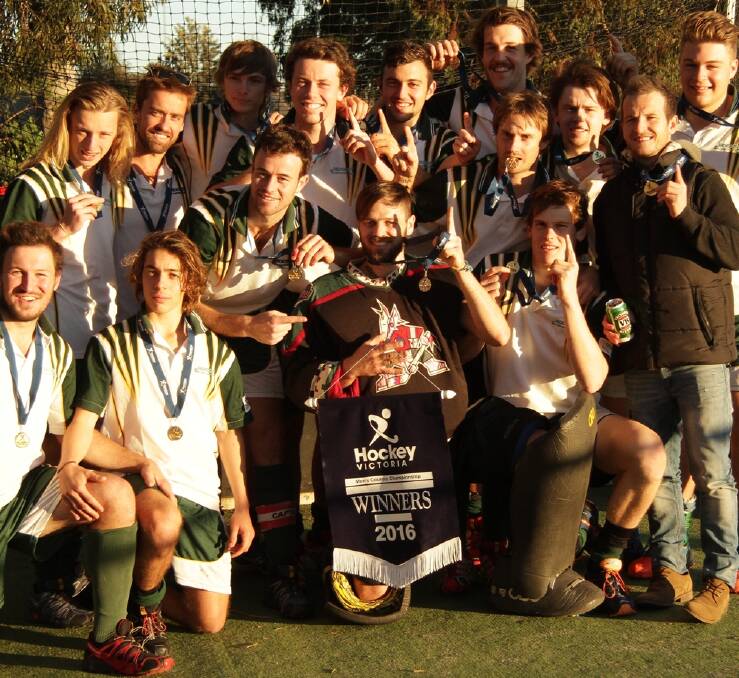 WINNERS ARE GRINNERS: Hockey Albury-Wodonga celebrates its victory at the Victorian Country Championships. Picture: DON CULLEN
