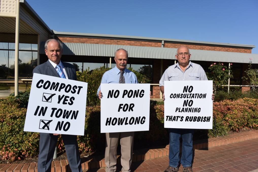 Anti-composting site campaigners Mark Shields, Stuart Sizer and Brian Hardidge with placards which have been displayed around Howlong.