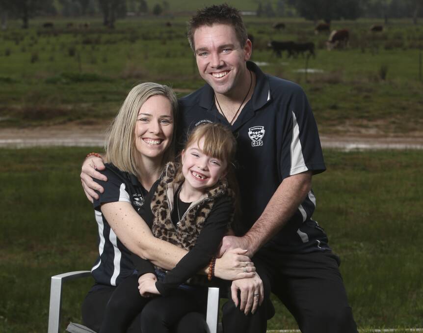 STRENGTH: Karl Jacka with wife Cristy and daughter Lucy, 7. Picture: ELENOR TEDENBORG