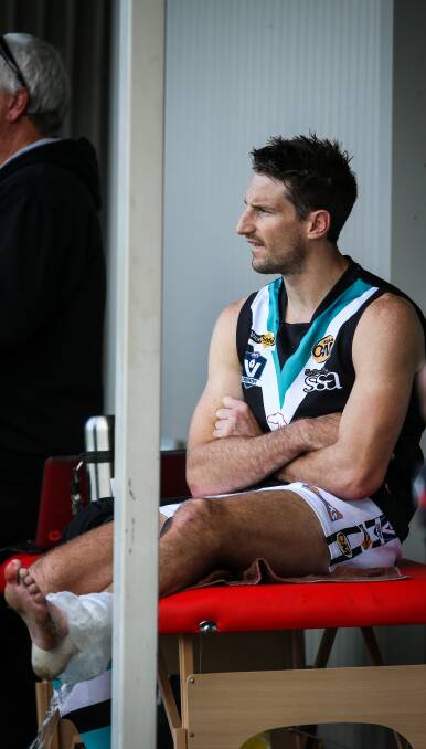 OUCH: Key Lavington big man Brant Dickson ices his injured ankle during the Panthers' stunning victory against Yarrawonga at J.C. Lowe Oval. Picture: JAMES WILTSHIRE