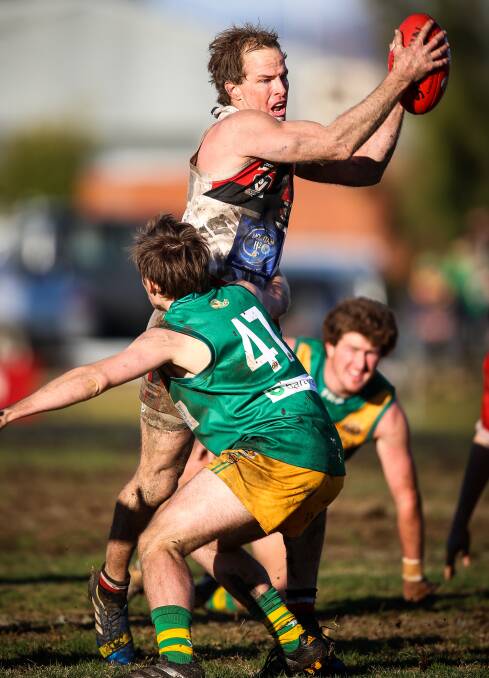 SPIRITED SAINTS: Co-coach Brad Murray was outstanding as Myrtleford notched up its fourth victory in a row with a 34-point win over North Albury. Picture: JAMES WILTSHIRE