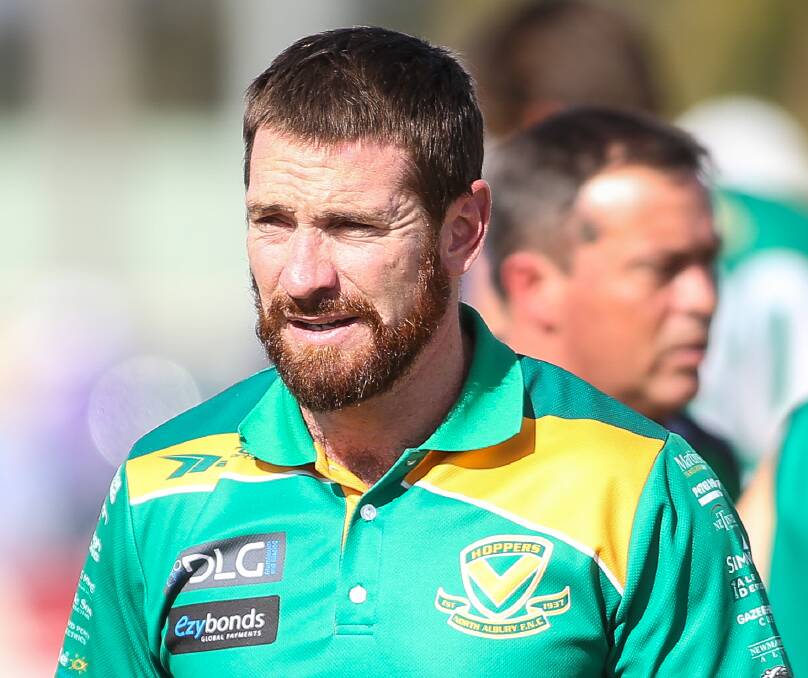ON THE HOP: Coach Jason Akermanis will leave North Albury's match with Myrtleford at quarter-time.