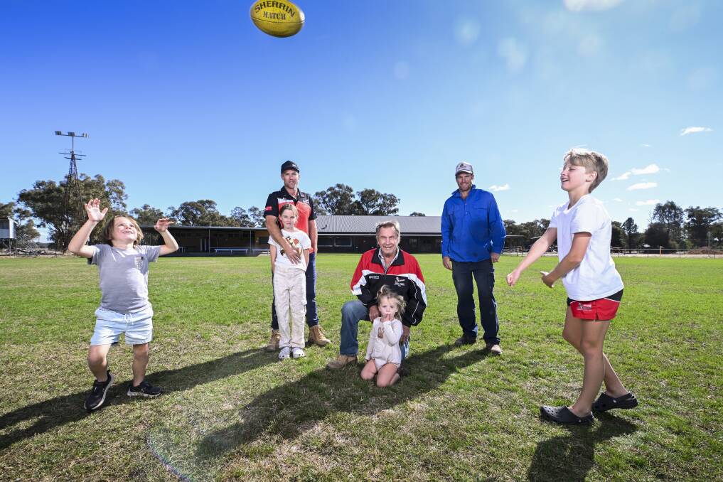 David Schilg, centre, with sons Luke and Jordan, as well as four of his 11 grandchildren, Sonny, 6, Billy, 10, Milla, 8, and Molly, 2. Picture by Mark Jesser