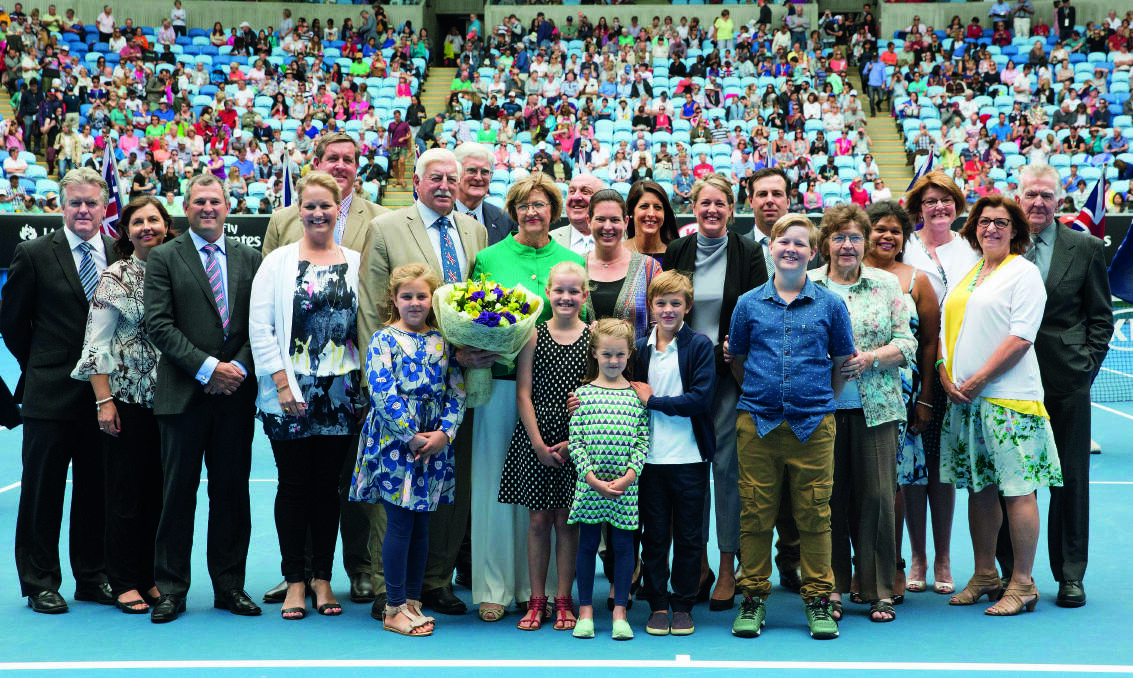 CENTRE COURT: Margaret Court with her family during a ceremony at Margaret Court Arena in 2015. It was formerly known as Show Court One, but was renamed on the eve of the 2003 Australian Open. Picture: TENNIS AUSTRALIA