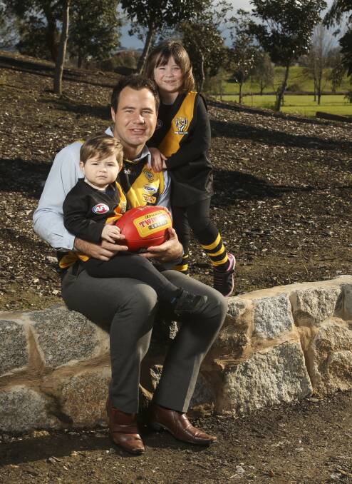 TIGER CUBS: Peter Cook's biggest fans, son Oliver, 19 months, and daughter Matilda, 4, will be there to cheer on Barnawartha. Picture: ELENOR TEDENBORG