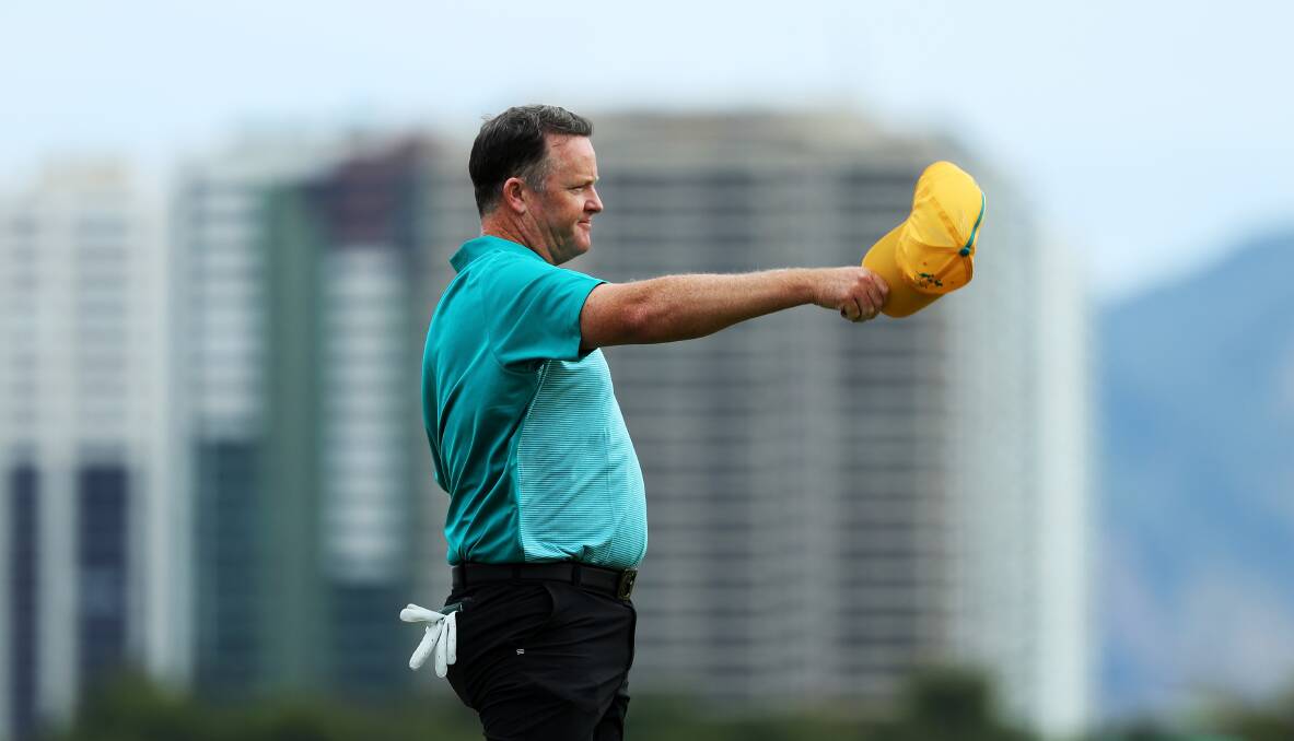 WELL PLAYED: Marcus Fraser acknowledges his eight-under round at the Olympic Golf Course in Rio de Janeiro. Picture: GETTY IMAGES