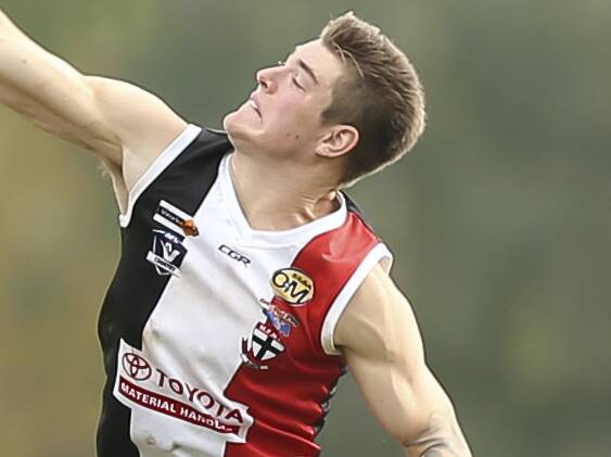 HURT: Myrtleford ruckman Tom McDonagh copped a heavy knock to the leg in Saturday's win over Corowa-Rutherglen at John Foord Oval.