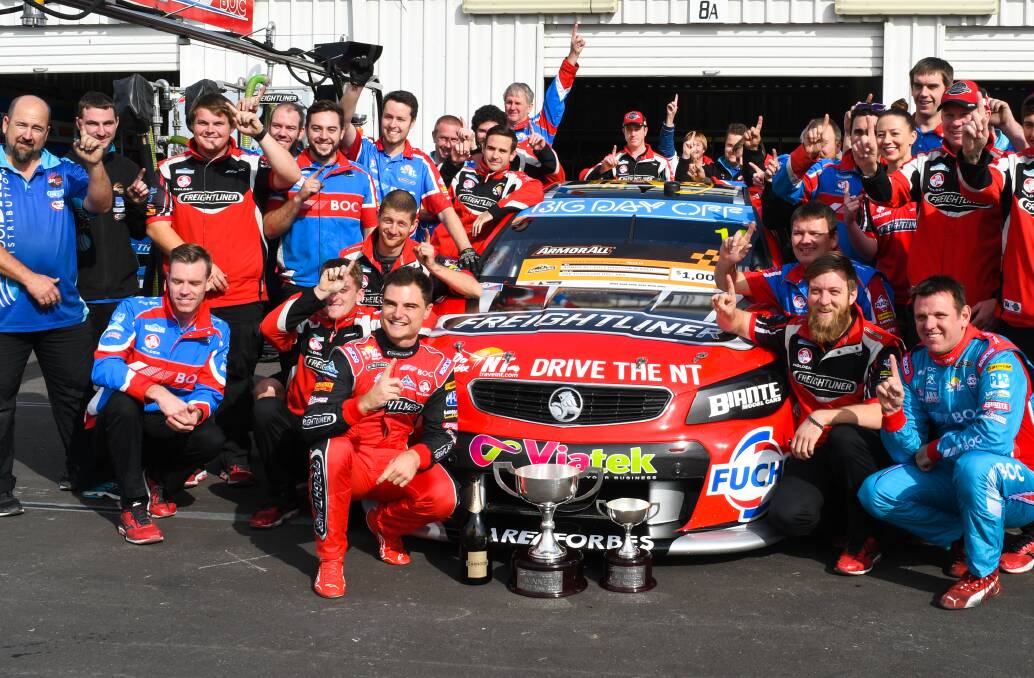 TEAM EFFORT: Brad Jones Racing's team with the spoils of victory after Tim Slade won Saturday's race at Winton in emphatic fashion. Pictures: TIM FARRAH, GETTY IMAGES