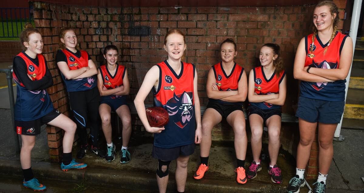 BRING IT ON: Chelsea Styan, centre, and her Wodonga Raiders teammates will take on Lavington Panthers at Birallee Park on Saturday night. Picture: MARK JESSER