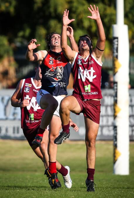 FLYING HIGH: Wodonga Raiders' nine-goal hero Jydon Neagle soared over Bulldog defender Sam Livingstone for one of his 15 marks for the day. Pictures: JAMES WILTSHIRE