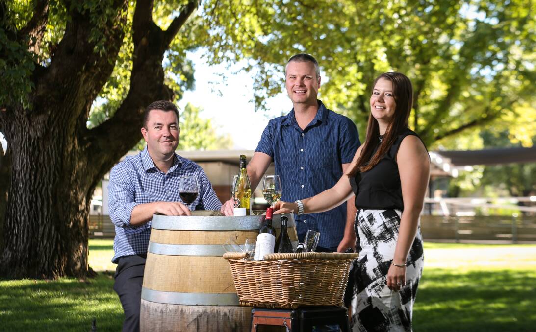 CHEERS: Albury Racing Club chief executive John Miller, committee member Craig Sheather and hospitality and events executive Amy Collins look forward to the twilight picnic meet on Friday, February 19. Picture: JAMES WILTSHIRE