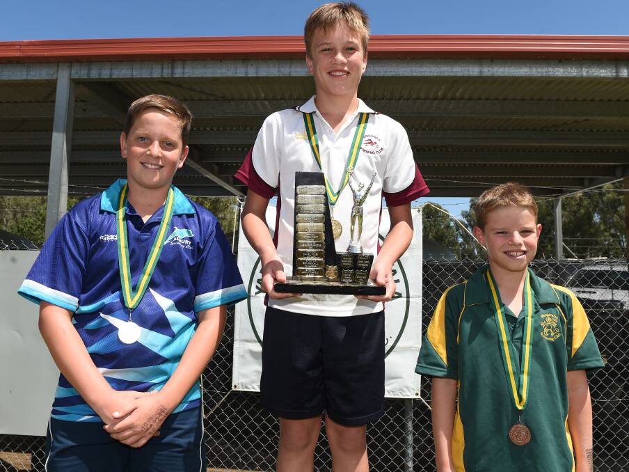 Wodonga's Lachlan Payne, centre, proved too strong for Albury's William Murphy and Wangaratta's Zac Watson in the 12-year-old boys' 100m freestyle.