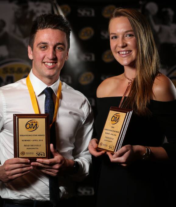 BRIGHT FUTURES: Wangaratta's Brad Melville and North Albury's Nakita Singe with their Rising Star awards on Monday night. Picture: JAMES WILTSHIRE