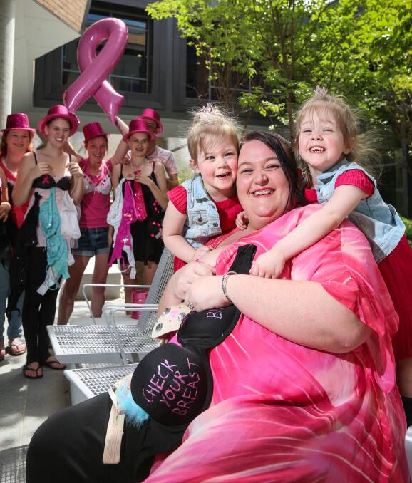 MISSION ACCOMPLISHED: Jessica McDonald, her twins Layla and Lyela Hobbs, 3, and the rest of the Bra Bandits celebrate reaching their goal to raise $1000 for the Albury Wodonga Regional Cancer Centre. Picture: JAMES WILTSHIRE