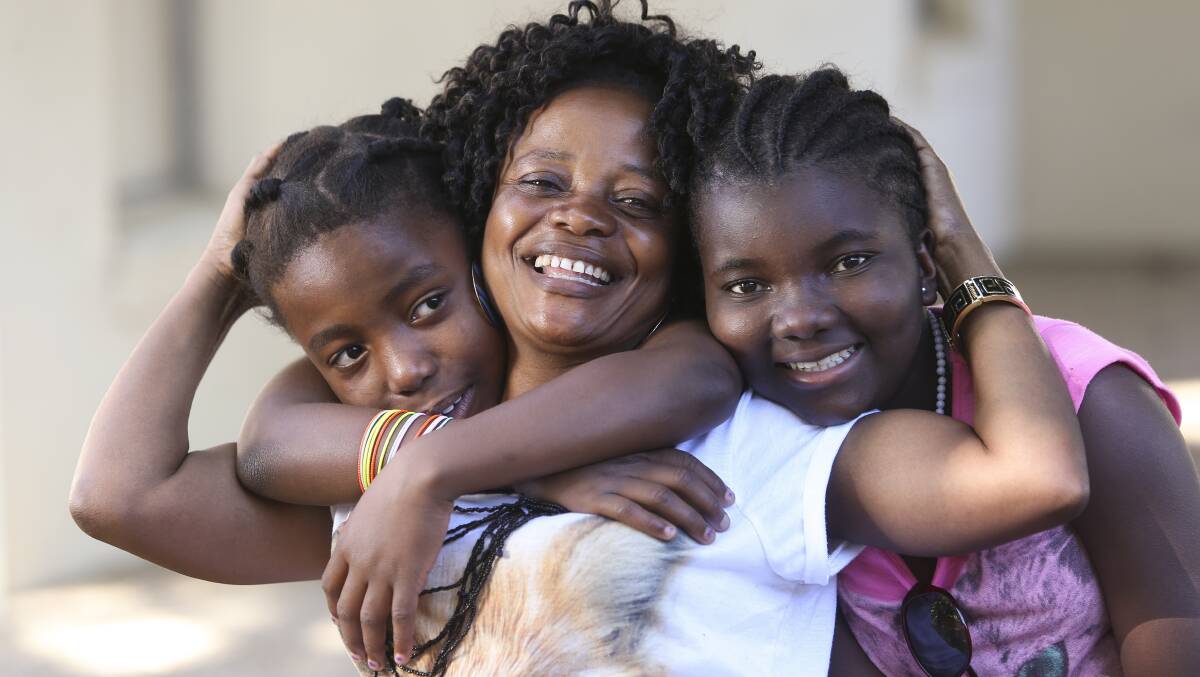 Delighted: Congolese refugee Apolina Kakonga is thrilled her daughters Eliza and Honorina (pictured) and two sons have a new future in Australia. Pictures: ELENOR TEDENBORG