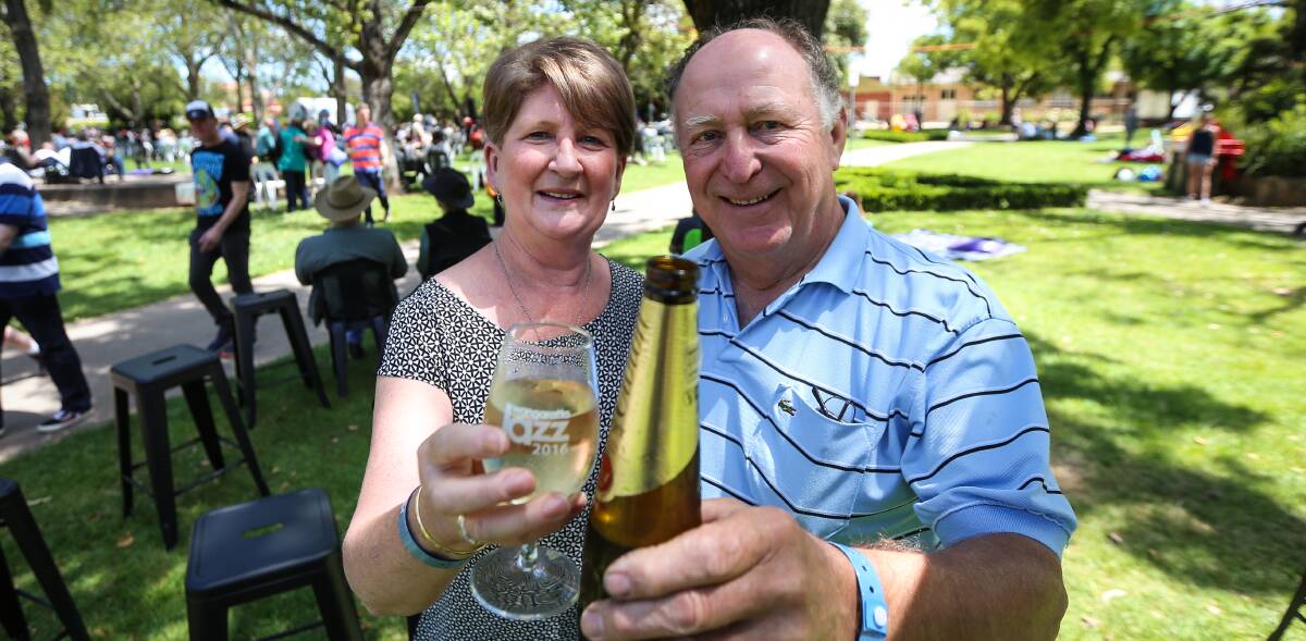 Jazz perfect: Sue and Brendan Clayton from Wangaratta enjoy a cold one in the gardens. Organisers were delighted by the community's tremendous support.