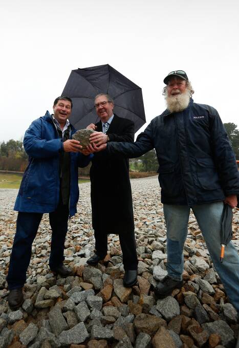 Celebration time: Bill Tilley, Bernard Gaffney and Beechworth resident Kevin Weir at Saturday's official re-opening of Lake Sambell. PIcture: Mark Jesser