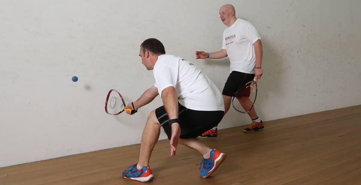 ON OUR WAY: Mitchell Neon and Chris Breitkopf compete during the opening hour of the marathon racquetball and squash event held in Wodonga. Picture: JAMES WILTSHIRE