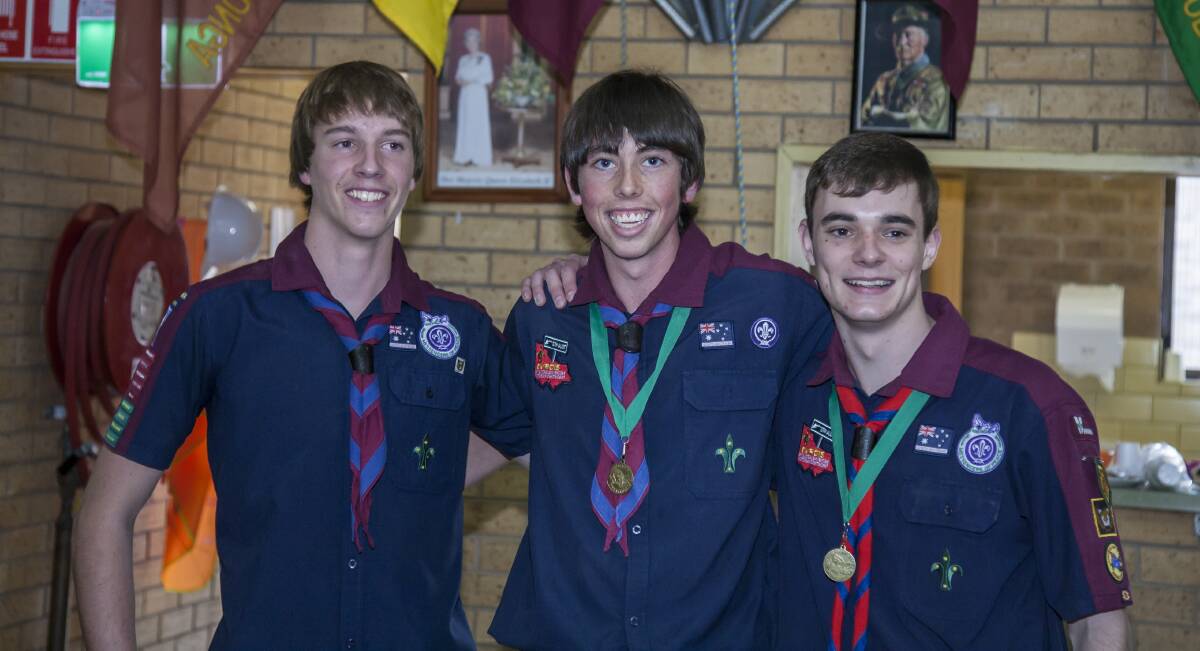 QUEEN'S SCOUTS: Tristan Hedditch, Sheldon Smith and Adam Peters, of 1st Baranduda and 3rd Wodonga Venturer Scouts, celebrate together.