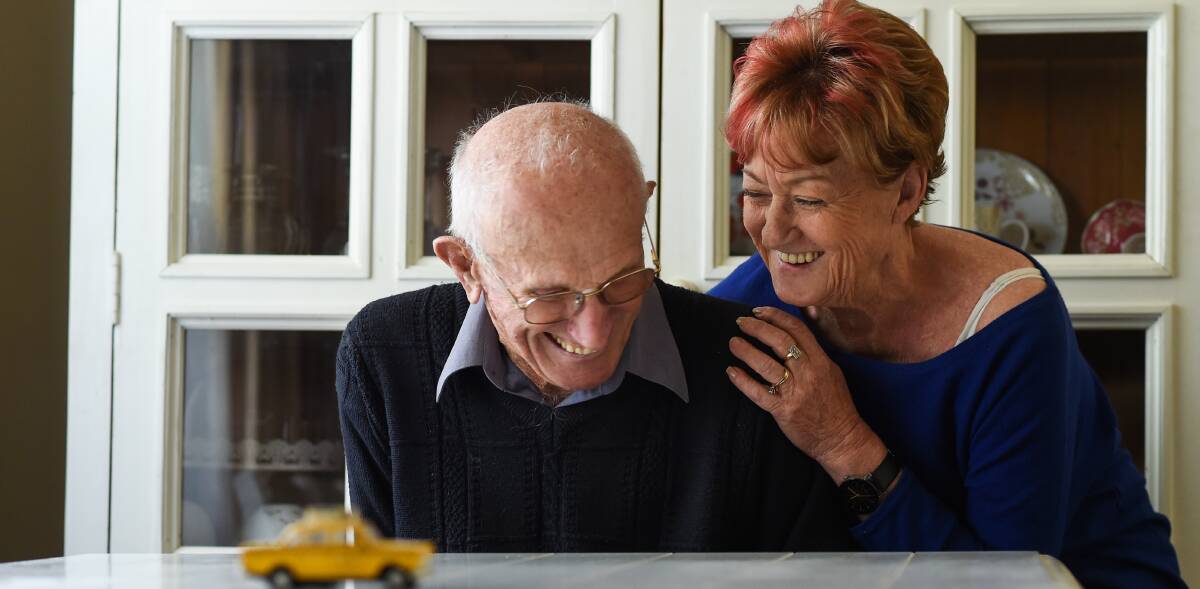 A SHARED PROFESSION: Alan English enjoys a laugh with his wife Wendy. The pair met through taxis, when Wendy, now a driver herself, came looking for a job.